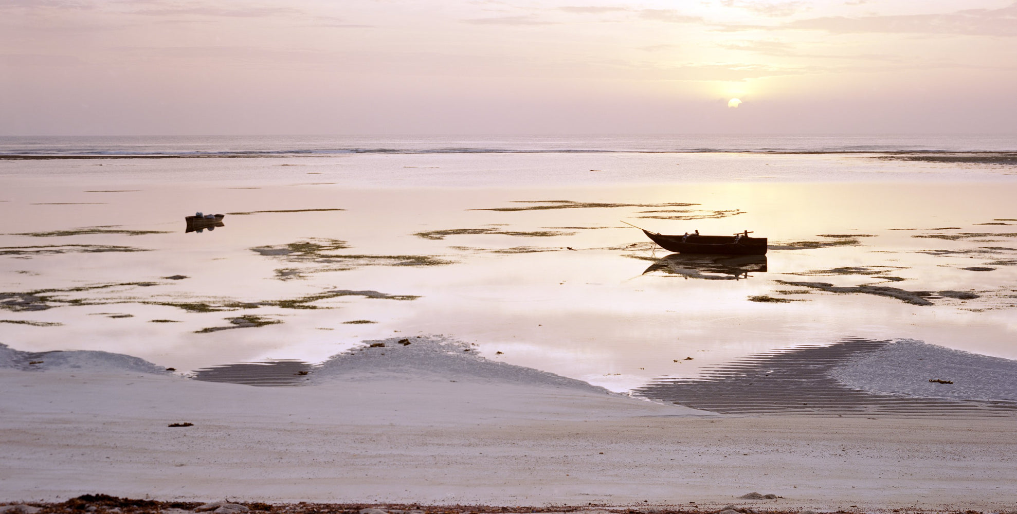 Two wooden dhows on the tidal flats at Tiwi Beach, Kenya, at sunrise, a 6x12 panorama shot on the Intrepid Super 120