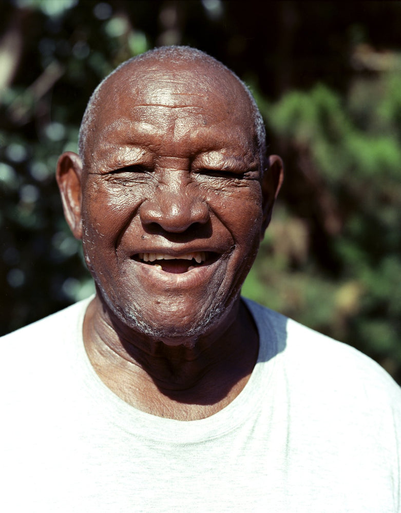 Portrait of Khulu smiling at Tiwi Beach, Kenya, shot on the Intrepid Super 120